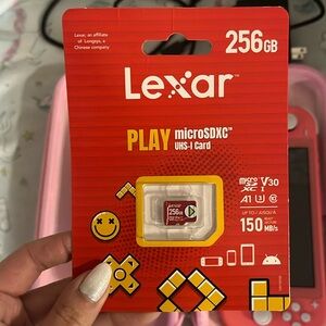 Pink Nintendo Switch Lite with Case and Two Games